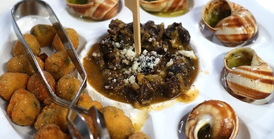 Protagonista assoluta sarà naturalmente la lumaca, preparata secondo la tradizione, insieme a tantissime altre specialità tipiche, piatti della cucina emiliana